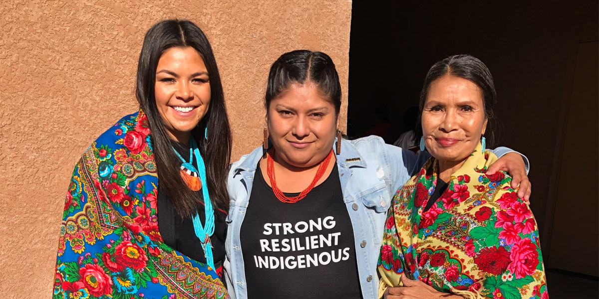 Mayane (at left) celebrating Indigenous Peoples’ Day in New Mexico with Tribal community members