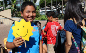 Florida child with sun sign