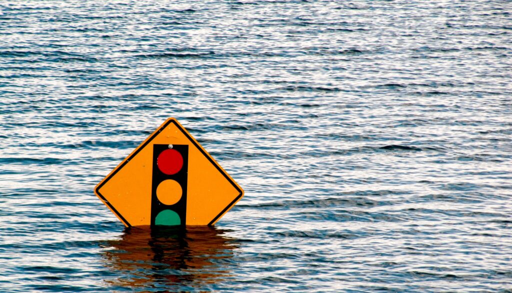 Stop sign covered in water