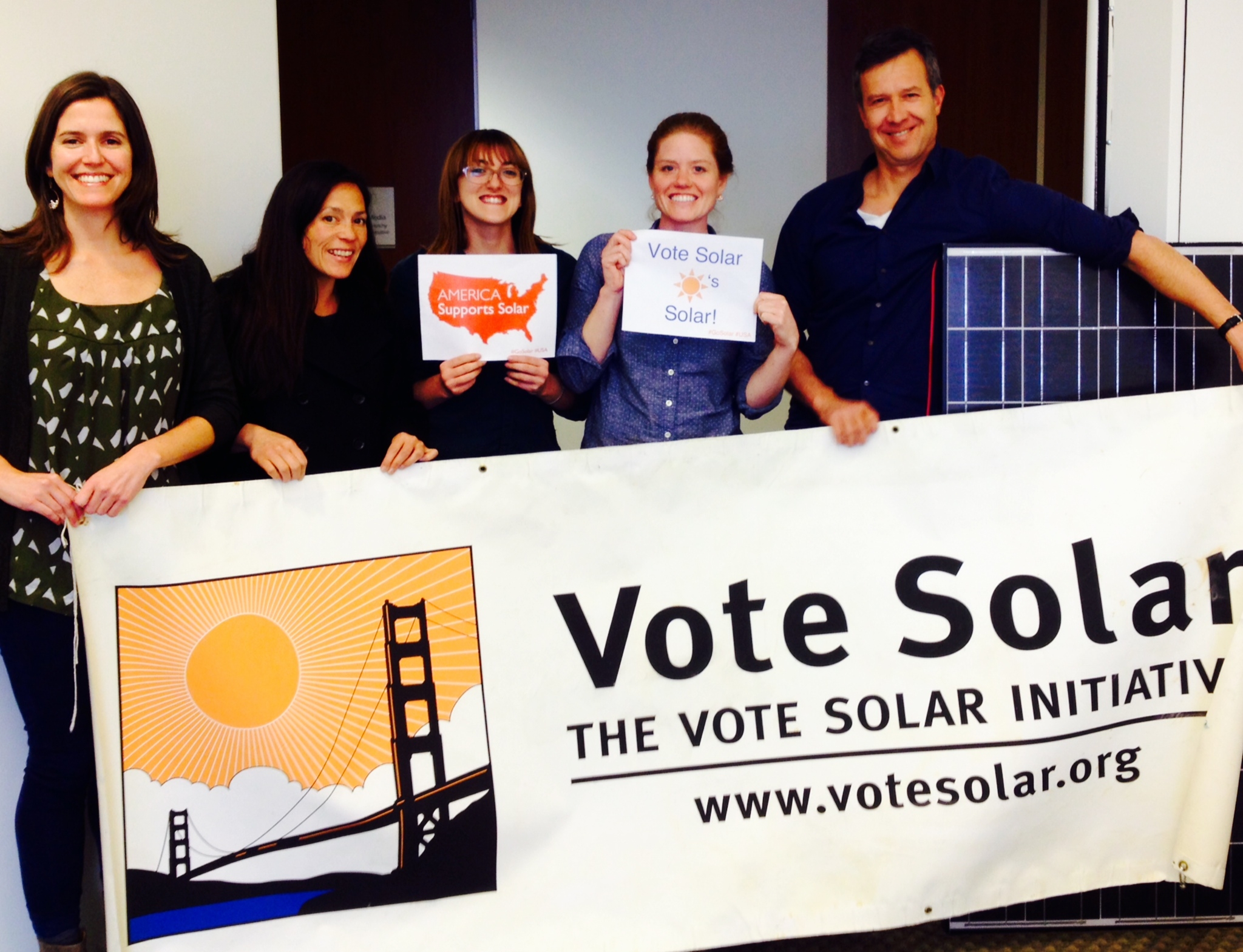 Adam with the growing Vote Solar team in 2014