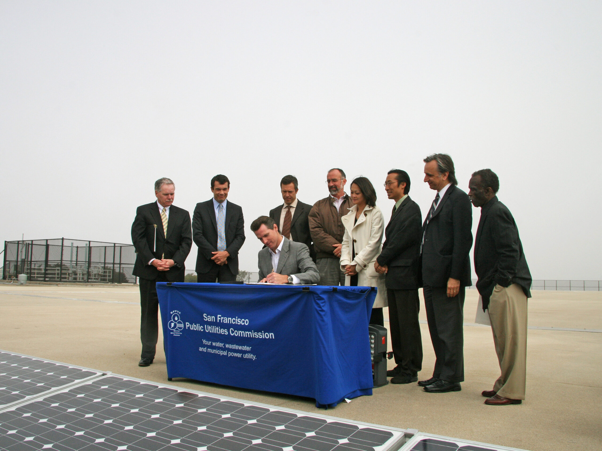 Adam at the San Francisco Public Utilities Commission Signing in 2009, commissioning of the Sunset Reservoir Solar Project, one of the largest municipal solar projects of its time. 